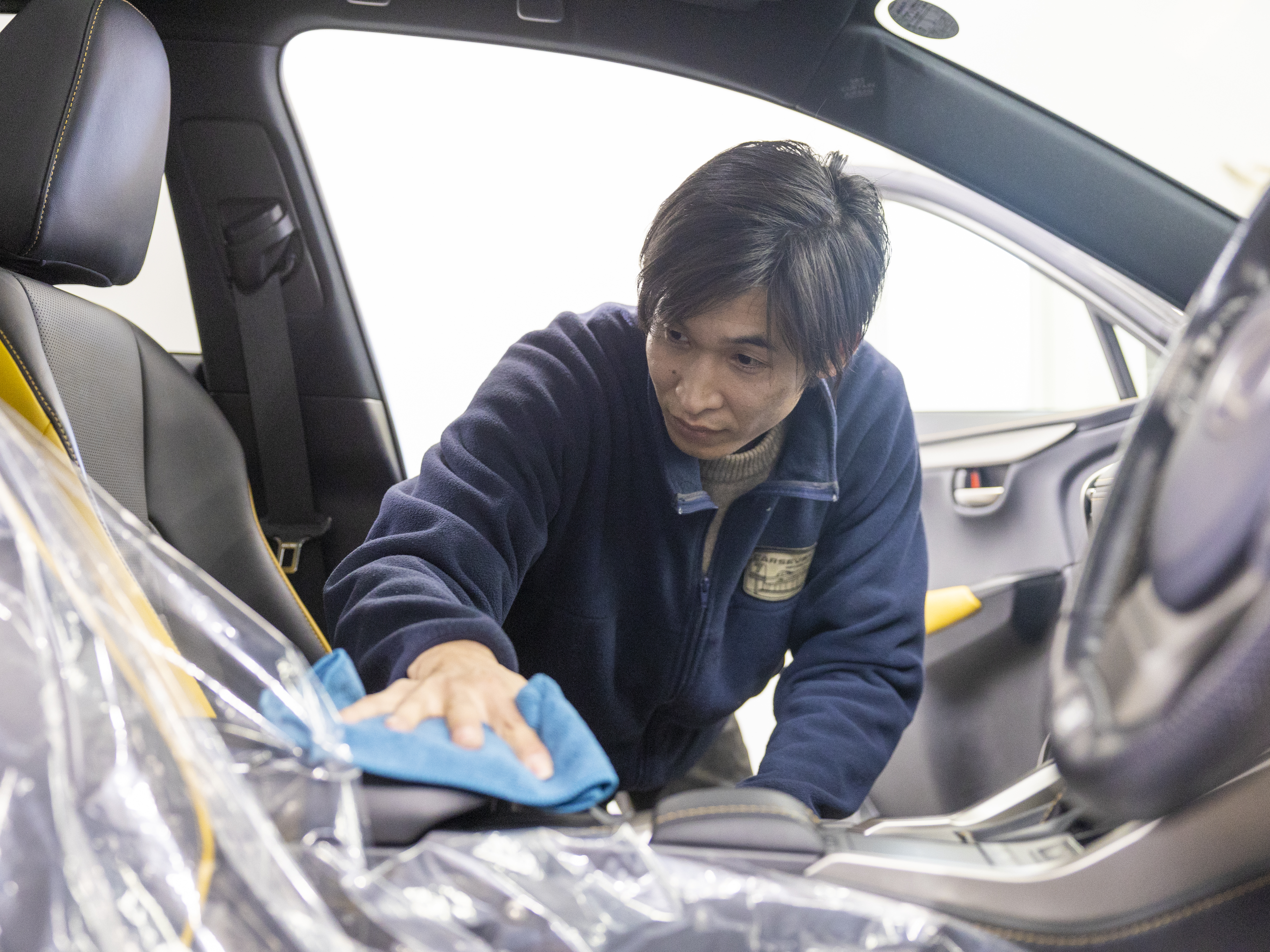 KeePerの技術認定は2級→1級→EX1級と三段階。札幌のKeePer研修センターで講習や実技研修を受けることで資格を取得できます（受講費用は会社負担）。